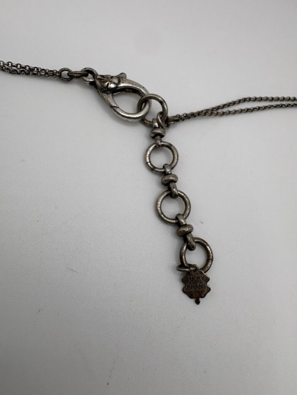 Lucky Brand Bird Flower Peace Long Charm Pendant Necklace Silver Tone Boho - Picture 3 of 5